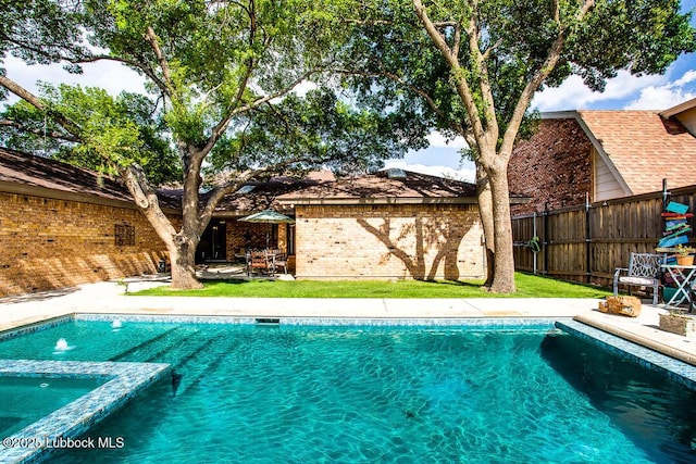 9206 Wayne Ave, Lubbock, TX 79424 - view of pool featuring a fenced backyard and a pool with connected hot tub