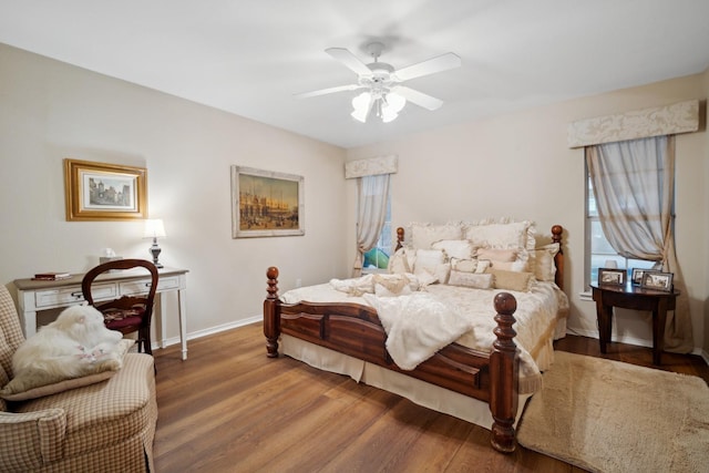 bedroom featuring hardwood / wood-style floors and ceiling fan