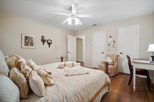 bedroom featuring dark wood-type flooring and ceiling fan