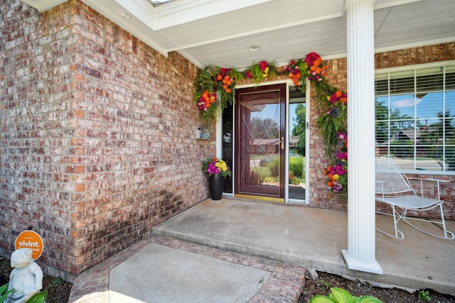 property entrance with covered porch