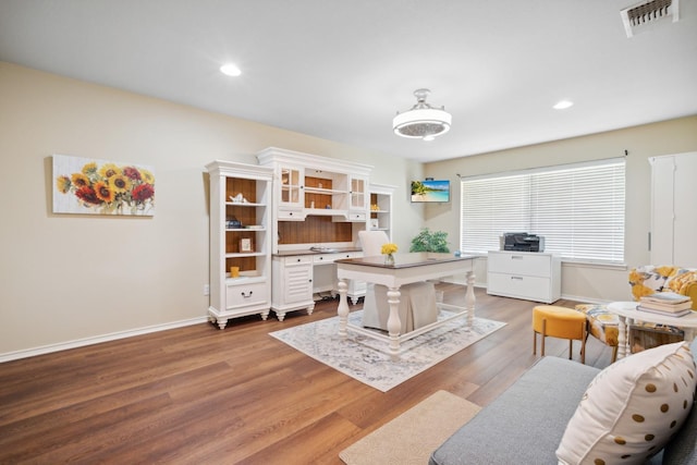 home office featuring hardwood / wood-style floors