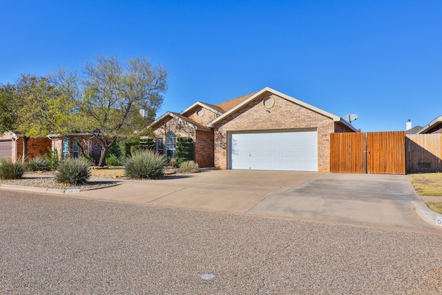 single story home with a garage