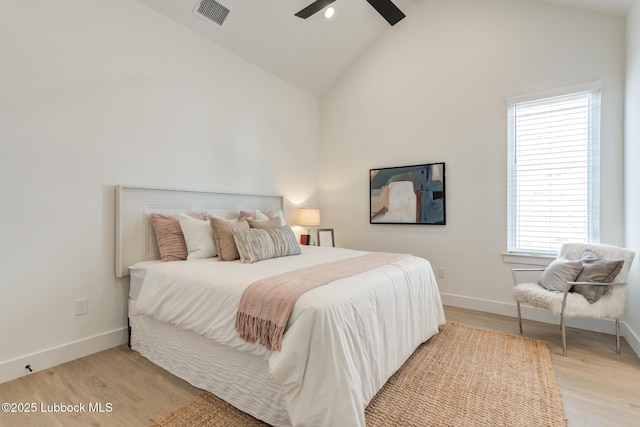 4029 136th St, Lubbock, TX 79423 - bedroom featuring baseboards, light wood-type flooring, a ceiling fan, and high vaulted ceiling