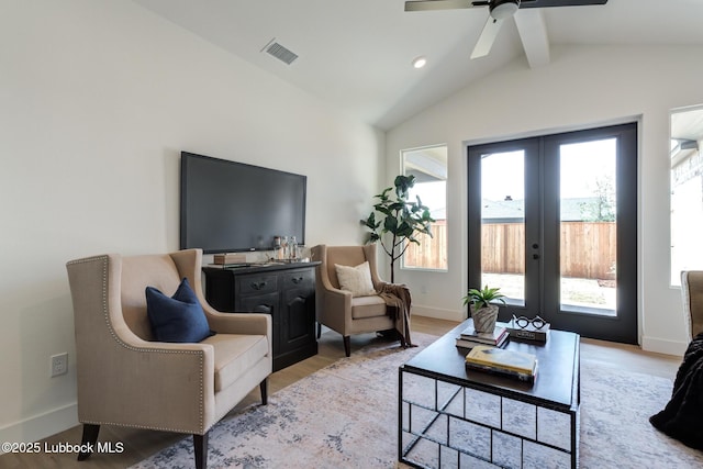 4029 136th St, Lubbock, TX 79423 - living area featuring plenty of natural light, ceiling fan, light wood-style flooring, and french doors