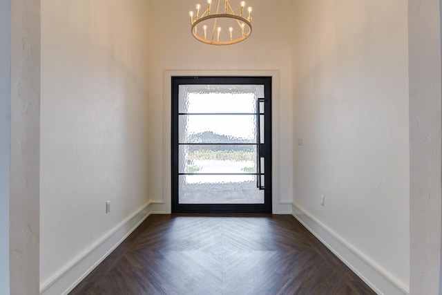 7710 46th St, Lubbock, TX 79407 - foyer featuring a chandelier and baseboards