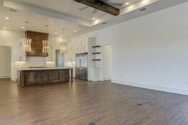 7710 46th St, Lubbock, TX 79407 - kitchen featuring stainless steel built in refrigerator, open shelves, dark wood finished floors, recessed lighting, and white cabinetry