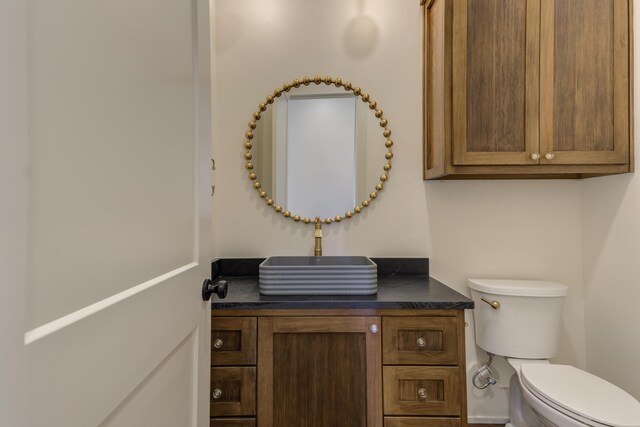 7710 46th St, Lubbock, TX 79407 - bathroom featuring toilet and vanity