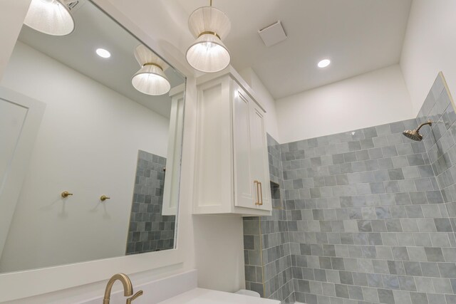 7710 46th St, Lubbock, TX 79407 - bathroom with tiled shower and recessed lighting
