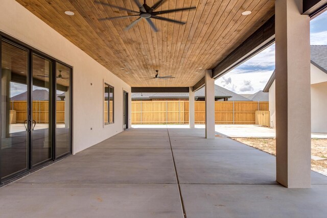 7710 46th St, Lubbock, TX 79407 - fenced backyard featuring ceiling fan and a patio area