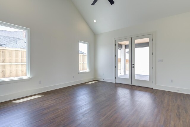 7710 46th St, Lubbock, TX 79407 - spare room featuring ceiling fan, french doors, dark wood-type flooring, and high vaulted ceiling