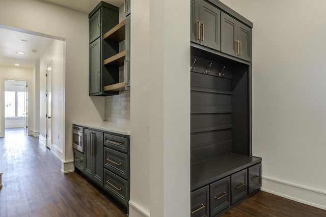 7710 46th St, Lubbock, TX 79407 - mudroom with dark wood-type flooring and recessed lighting