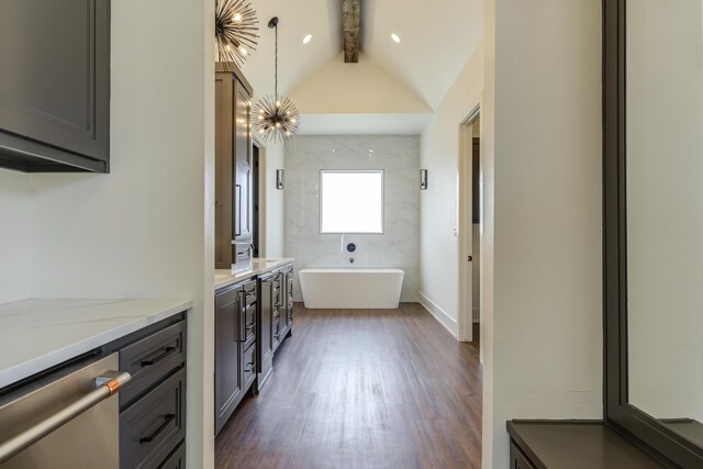 7710 46th St, Lubbock, TX 79407 - laundry area featuring dark wood-style flooring
