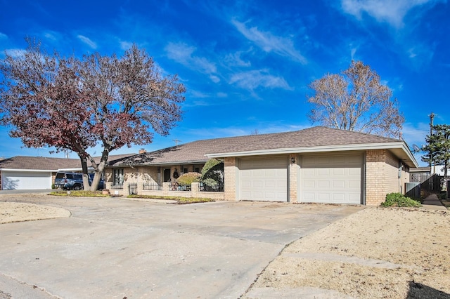 ranch-style house featuring brick siding