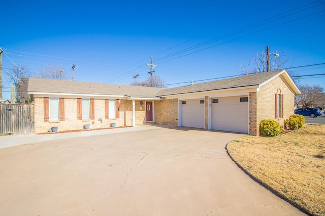 single story home featuring a garage