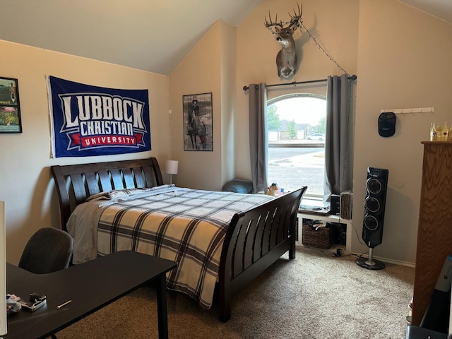 carpeted bedroom with vaulted ceiling