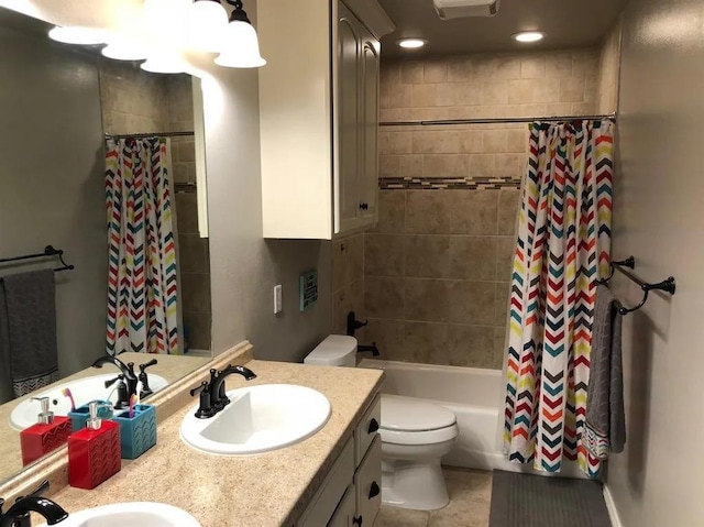 full bathroom featuring vanity, toilet, and shower / bath combo with shower curtain