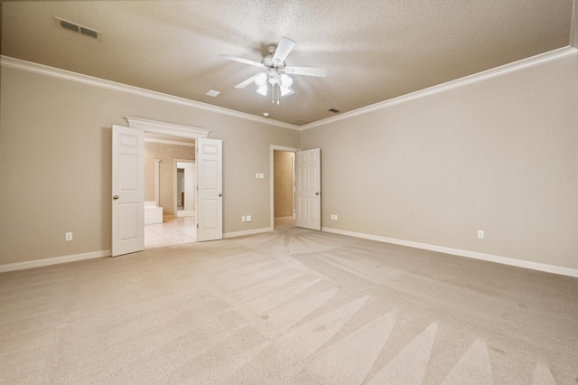 unfurnished bedroom featuring ornamental molding, light carpet, and ceiling fan