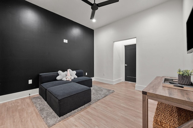living area featuring light wood-style flooring, baseboards, recessed lighting, and ceiling fan