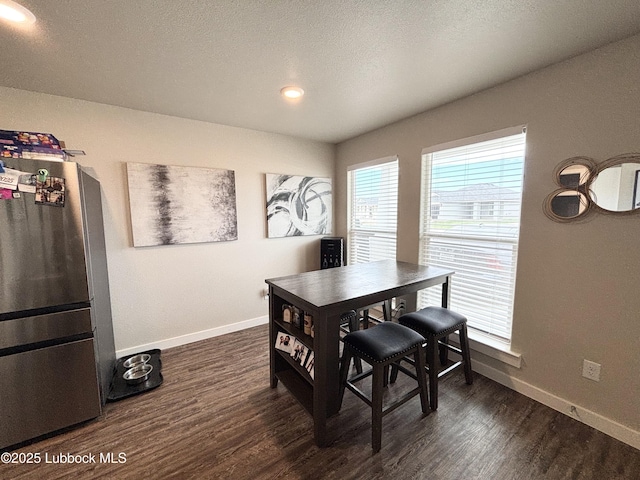 1901 134th St, Lubbock, TX 79423 - dining area featuring baseboards, dark wood-type flooring, and recessed lighting