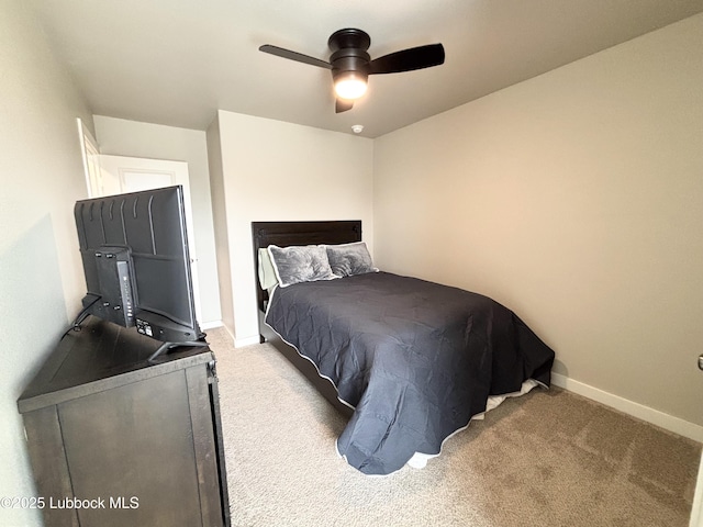 1901 134th St, Lubbock, TX 79423 - carpeted bedroom with baseboards and a ceiling fan