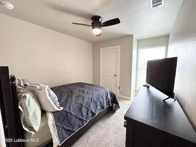 1901 134th St, Lubbock, TX 79423 - bedroom with carpet floors, baseboards, and ceiling fan