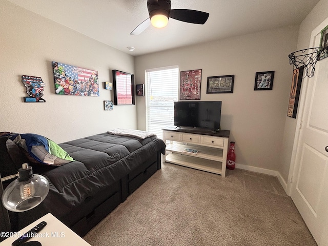 1901 134th St, Lubbock, TX 79423 - bedroom with carpet flooring, ceiling fan, and baseboards