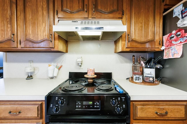 kitchen with black electric range oven