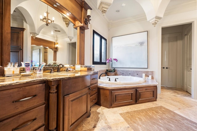 bathroom featuring a bath, vanity, and crown molding