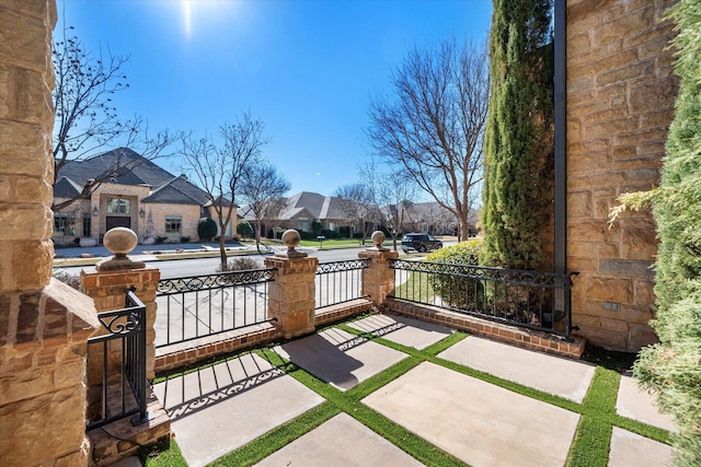 view of patio featuring a residential view