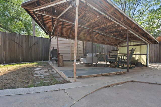 view of parking / parking lot with fence