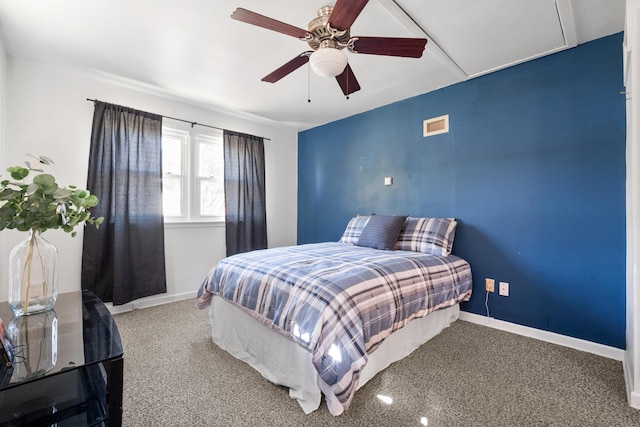 bedroom with baseboards, visible vents, a ceiling fan, and carpet flooring