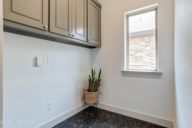 5713 116th St, Lubbock, TX 79424 - laundry room featuring baseboards and plenty of natural light