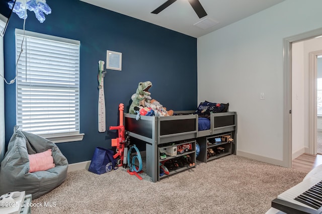 5713 116th St, Lubbock, TX 79424 - carpeted bedroom featuring a ceiling fan and baseboards