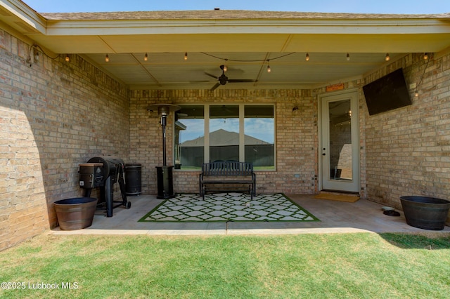 5713 116th St, Lubbock, TX 79424 - view of patio with a ceiling fan and area for grilling