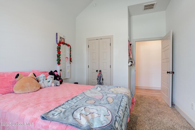 5713 116th St, Lubbock, TX 79424 - bedroom with carpet, a closet, and baseboards