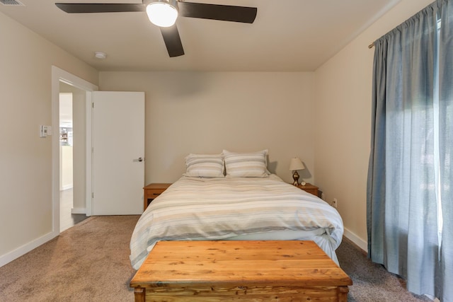 4615 11th St, Lubbock, TX 79416 - carpeted bedroom with baseboards and ceiling fan