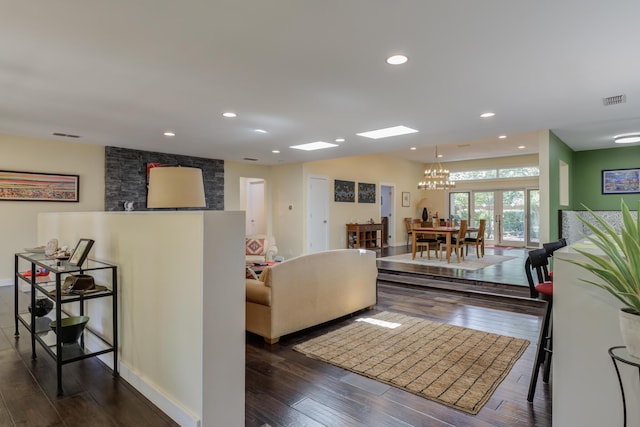 4615 11th St, Lubbock, TX 79416 - living room with dark wood-type flooring, a chandelier, and recessed lighting