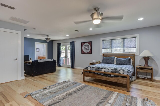 4615 11th St, Lubbock, TX 79416 - bedroom featuring wood finished floors, ceiling fan, recessed lighting, and access to outside
