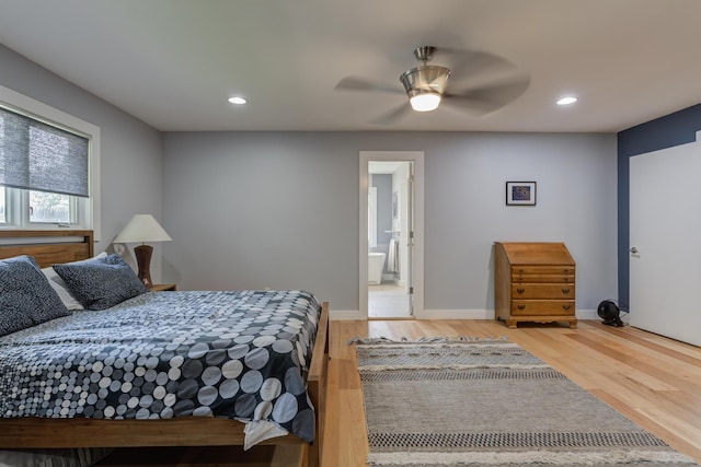 4615 11th St, Lubbock, TX 79416 - bedroom featuring wood finished floors, recessed lighting, connected bathroom, and a ceiling fan