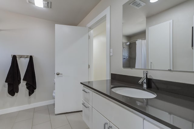 4615 11th St, Lubbock, TX 79416 - bathroom featuring vanity, tile patterned flooring, and a shower with shower curtain