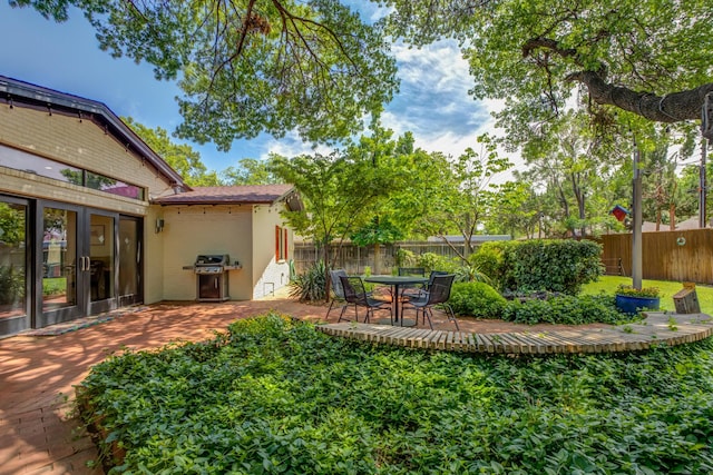 4615 11th St, Lubbock, TX 79416 - fenced backyard with a patio area