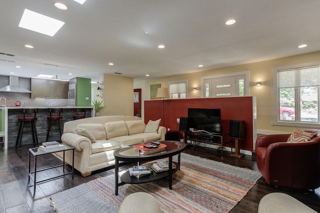 4615 11th St, Lubbock, TX 79416 - living area with dark wood-style floors, recessed lighting, and a skylight