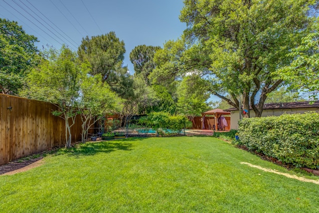 4615 11th St, Lubbock, TX 79416 - fenced backyard featuring a gazebo