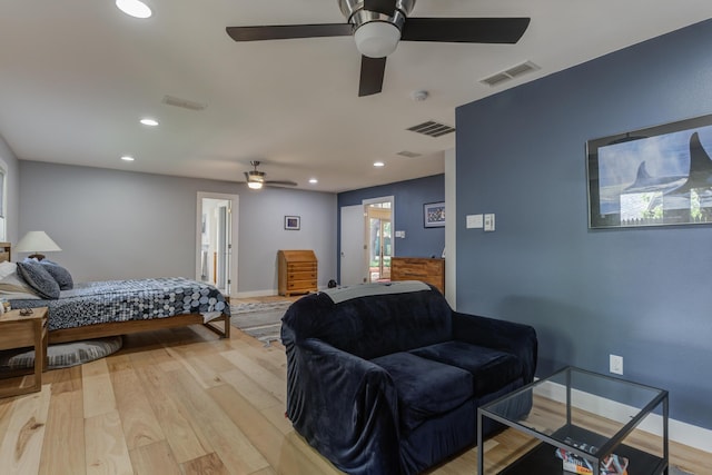 4615 11th St, Lubbock, TX 79416 - bedroom with light wood-type flooring, recessed lighting, and a ceiling fan