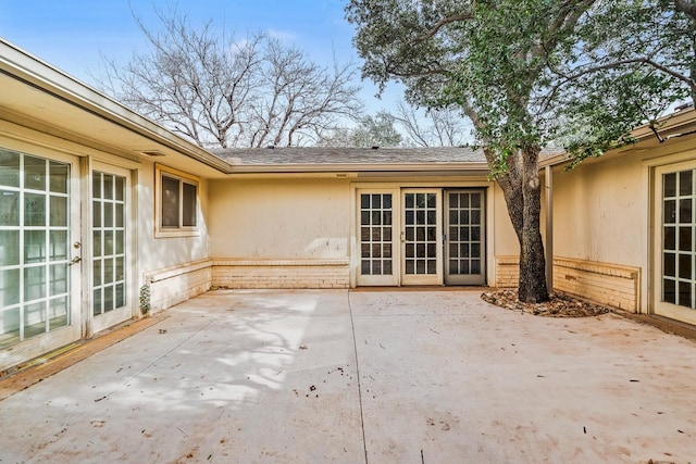 view of patio featuring french doors