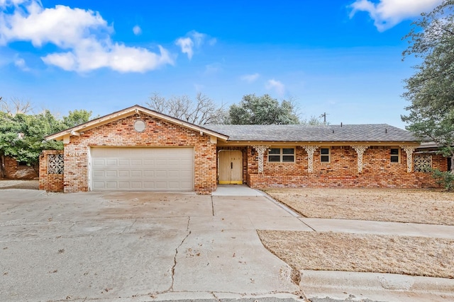 single story home with a garage