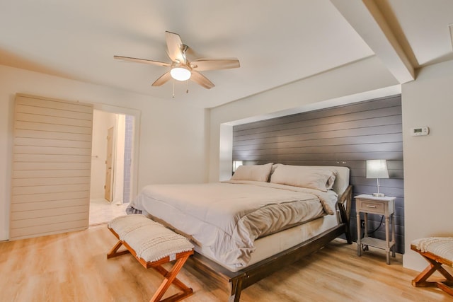 bedroom featuring light hardwood / wood-style flooring and ceiling fan