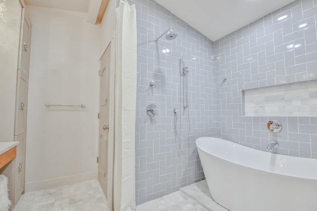 bathroom with tile walls and plus walk in shower