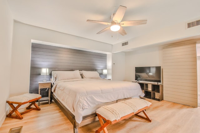 bedroom featuring ceiling fan and light wood-type flooring