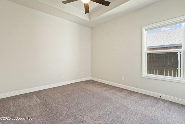 1016 N Genoa Ave, Lubbock, TX 79416 - carpeted empty room featuring ceiling fan and a tray ceiling